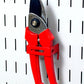 Pegboard Clip for Pruning Sheers on Pegboard Bracket