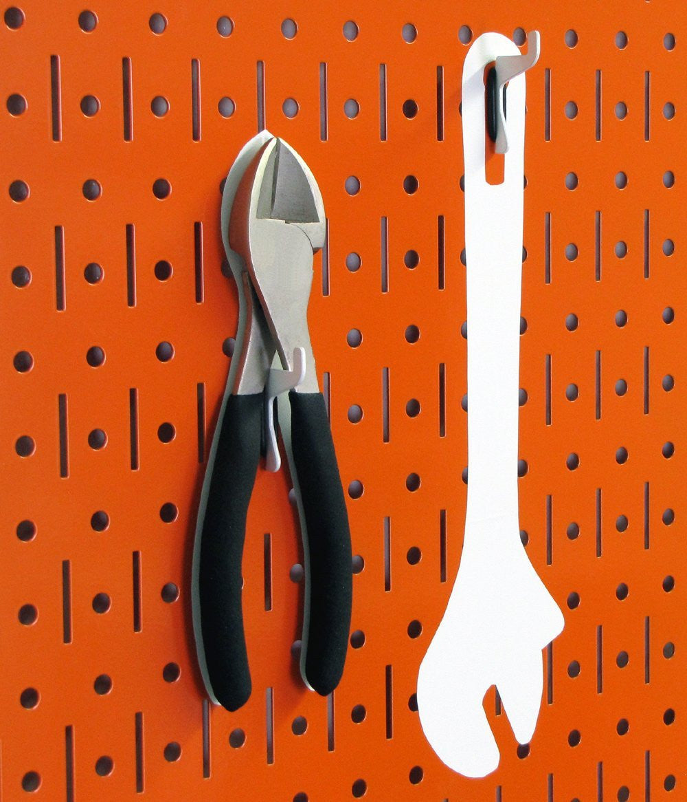 Orange Peg Board Holding Tools